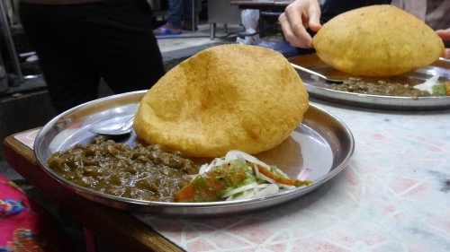 chole bature (fried, puffed bread paired with chickpea curry)